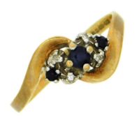 A 9ct gold ring set with small diamonds & sapphire