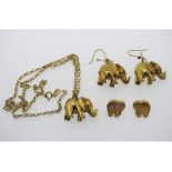 A 9ct gold 18in long chain with novelty elephant p