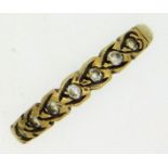 A 9ct gold half eternity ring set with CZ stones,