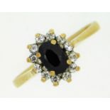 A 9ct gold ring set with sapphire & CZ, 2g, size N