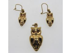 A pair of 9ct gold novelty owl earrings with match
