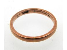 A 19thC. 9ct rose gold band, rubbed marks, 1.7g, s