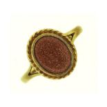 A 9ct gold ring set with goldstone, 2.4g, size P