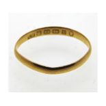 A 19thC. 22ct gold band, some misshaping, 1.3g, si