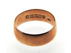 A 19thC. 9ct rose gold band, date letter for 1893,