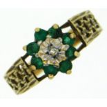 A 9ct gold ring set with emerald & small diamond,