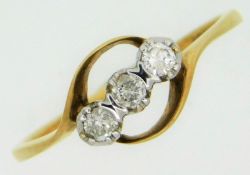 A 9ct gold trilogy ring set with three diamonds of