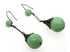 A pair of antique, white metal mounted jade 44mm drop earrings