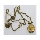 A 9ct gold 18in long chain with 'Footsteps' locket