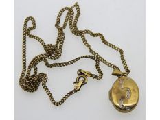 A 9ct gold 18in long chain with 'Footsteps' locket