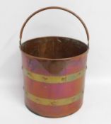 A copper & brass fireside bucket, 18in high to han