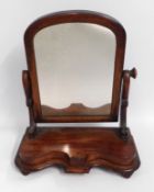 A mahogany dressing table mirror, lacking finial t