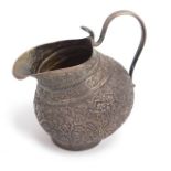 An antique white metal Asian silver jug, 180g