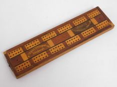 A McEwan Younger advertising cribbage board. 9.75i