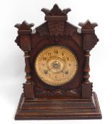An oak case Ansonia Clock Co. mantle clock, 15in t
