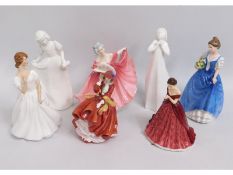 Seven Royal Doulton porcelain figurines: Top of th
