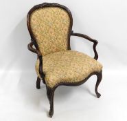 An upholstered armchair, 35in high to back