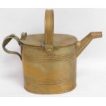 A brass watering can after Christopher Dresser, 11in tall