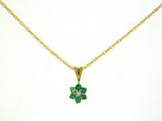 A 9ct gold chain with emerald & diamond pendant, 1