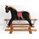 A child's Pegasus rocking horse, 39.5in high x 48i