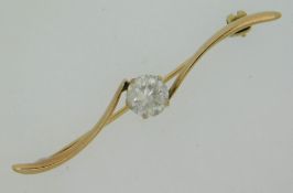 A 14ct gold brooch, 49mm wide, believed to be set