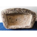 A shallow granite trough with drainage hole, 28in