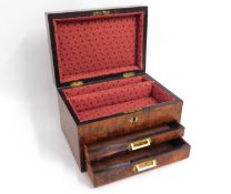 A 19thC. rosewood jewellery box with upholstered i
