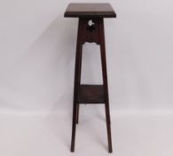 A wooden pot table, 36in tall & 9.5in square to to