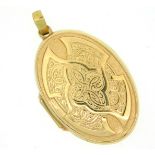 A 9ct gold locket with embossed decor, 35mm drop,