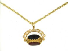 A 9ct gold chain with fob pendant of carnelian, bl