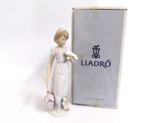 A boxed Lladro figure of a woman, 7611, 'Summer St