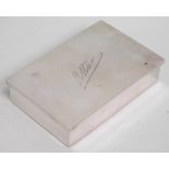 A London silver cigarette box by Daniel & John Welby, inscribed to top, 4.25in wide x 3in deep x 1in