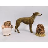 A Leonardo resin figure of a lurcher twinned with