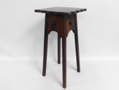 A wooden pot table, 24.5in tall & 11.5in square to