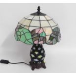 A Tiffany style table lamp, fixings somewhat loose