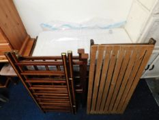 An Edwardian inlaid mahogany cot with later custom