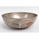 A silver on copper bowl with mixed silver & copper