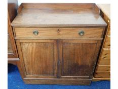 A 19thC. mahogany cupboard with drawer, 36in wide