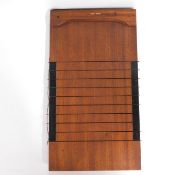 A mahogany Jaques of London shove ha'penny board,