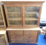 A 19thC. pine dresser with drawers & glazed cupboa