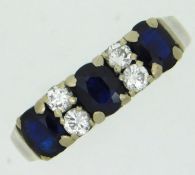 A 9ct white gold ring set with sapphire & diamonds, size M, 3.2g