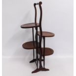 A mahogany collapsible cake stand, 34.75in tall