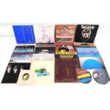 A quantity of thirty vinyl LP's including Beatles,