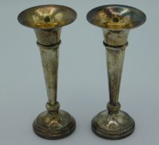 A pair of 1922 silver posy vases by Napper & Daven