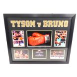 A cased boxing glove hand signed by former world h
