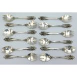 A set of twelve sterling silver sporks by Wallace