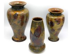 Three Doulton stoneware vases with autumnal leaf d