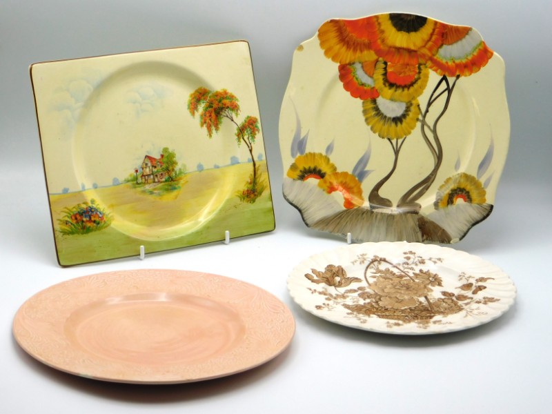 A Clarice Cliff 'Rhodanthe' plate, small chip, a Biarritz plate & two other Clarice Cliff plates, la