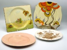 A Clarice Cliff 'Rhodanthe' plate, small chip, a Biarritz plate & two other Clarice Cliff plates, la