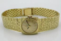 A 14ct gold ladies Tissot wristwatch, running orde